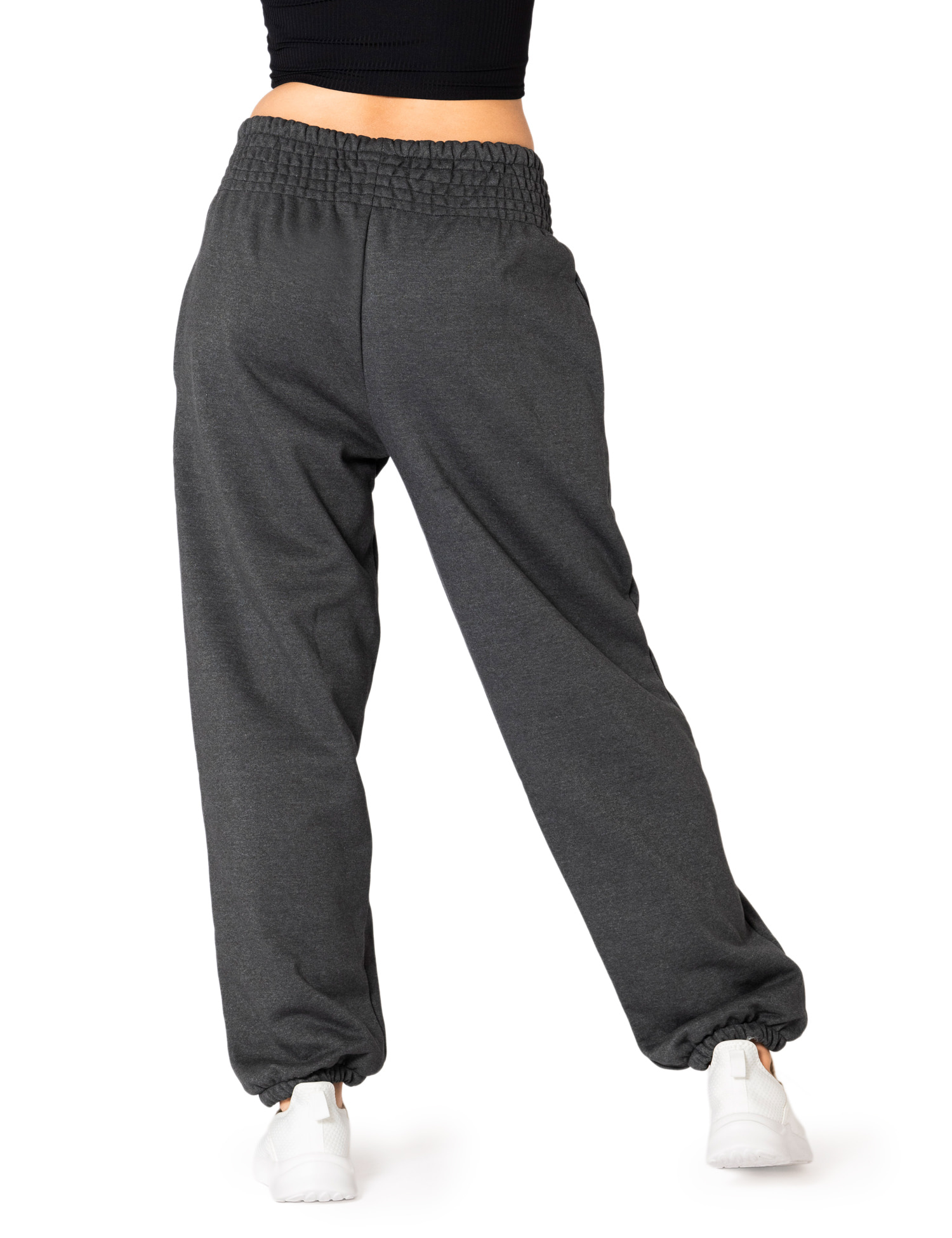 Back view of PANASIAM women’s cotton joggers in dark grey with a high shirred waistband, relaxed fit and elastic cuffs