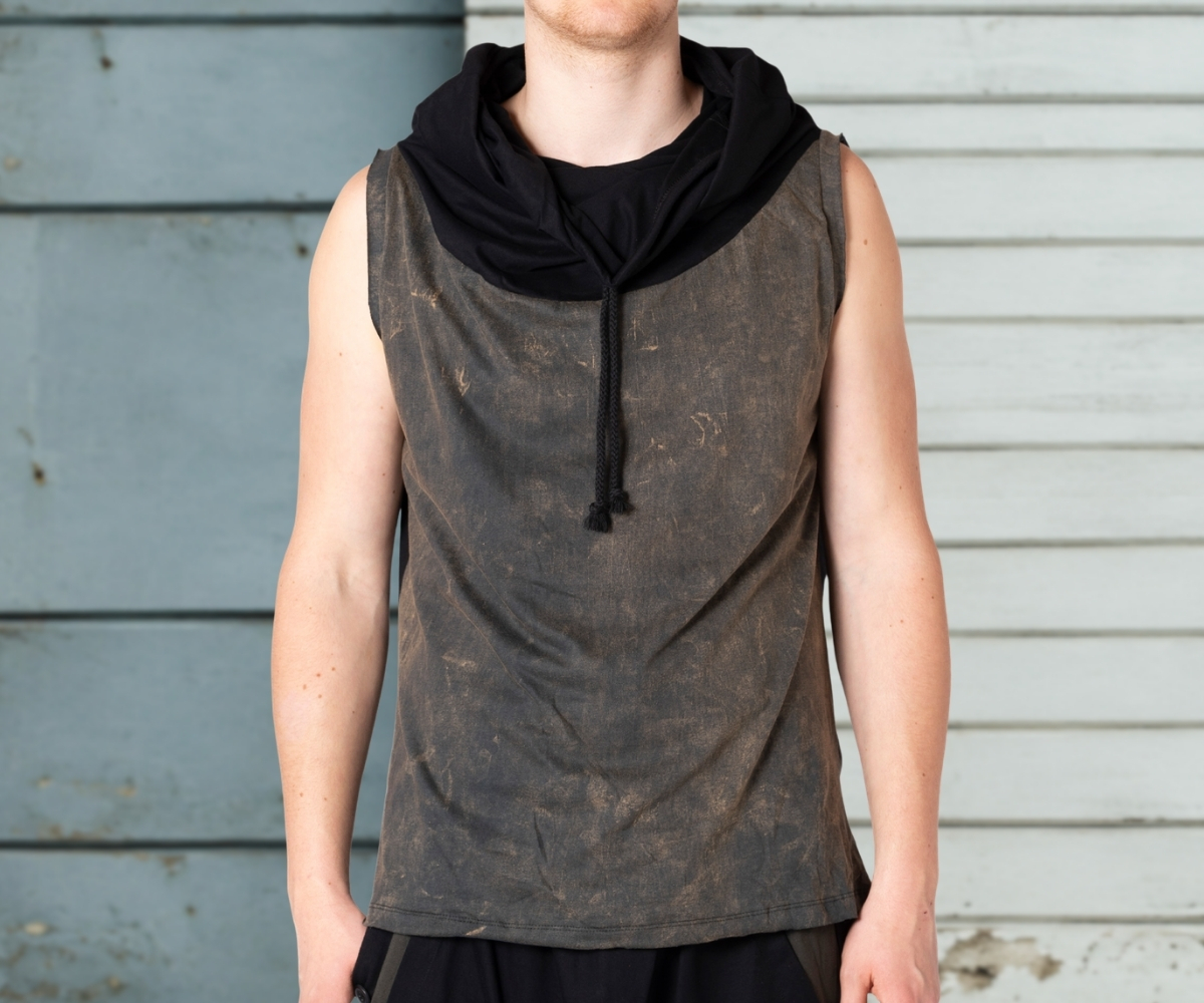 Model wearing a men’s sleeveless top in a dark distressed look with black hood, front view