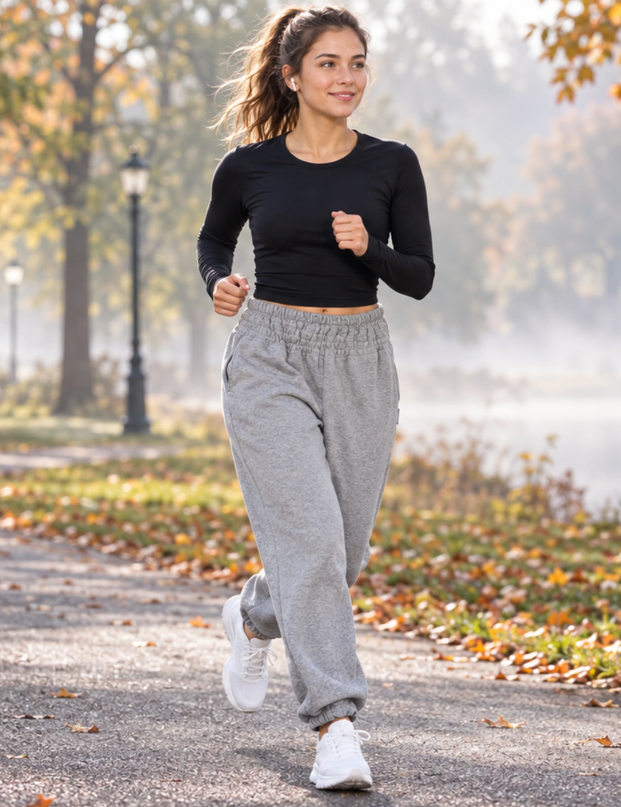PANASIAM women's cotton joggers with high shirred waistband in grey, relaxed fit, worn while jogging in the park