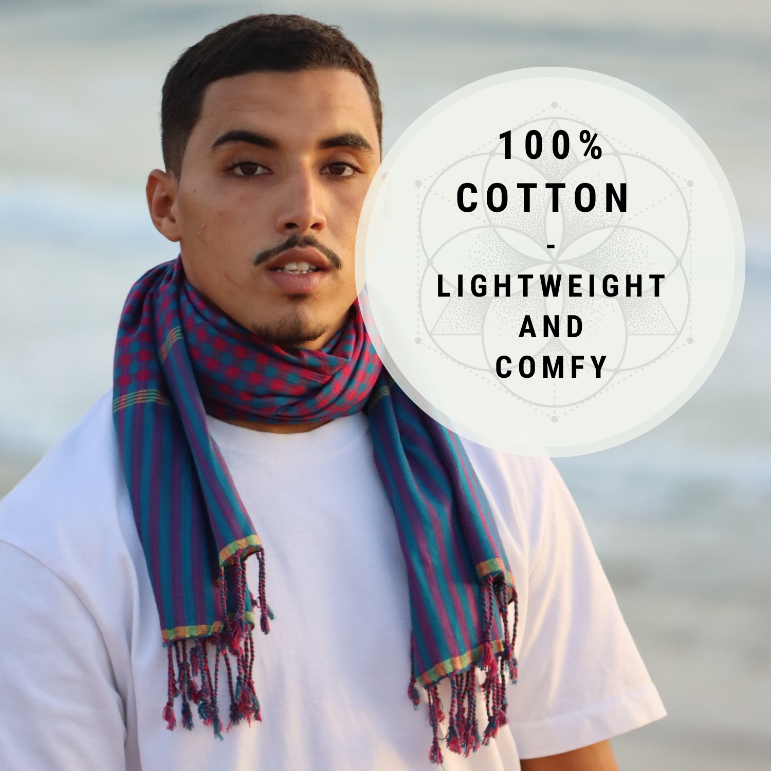 Model wearing a handwoven Krama scarf from Cambodia by PANASIAM in blue and magenta, made from 100% cotton, lightweight and comfortable.